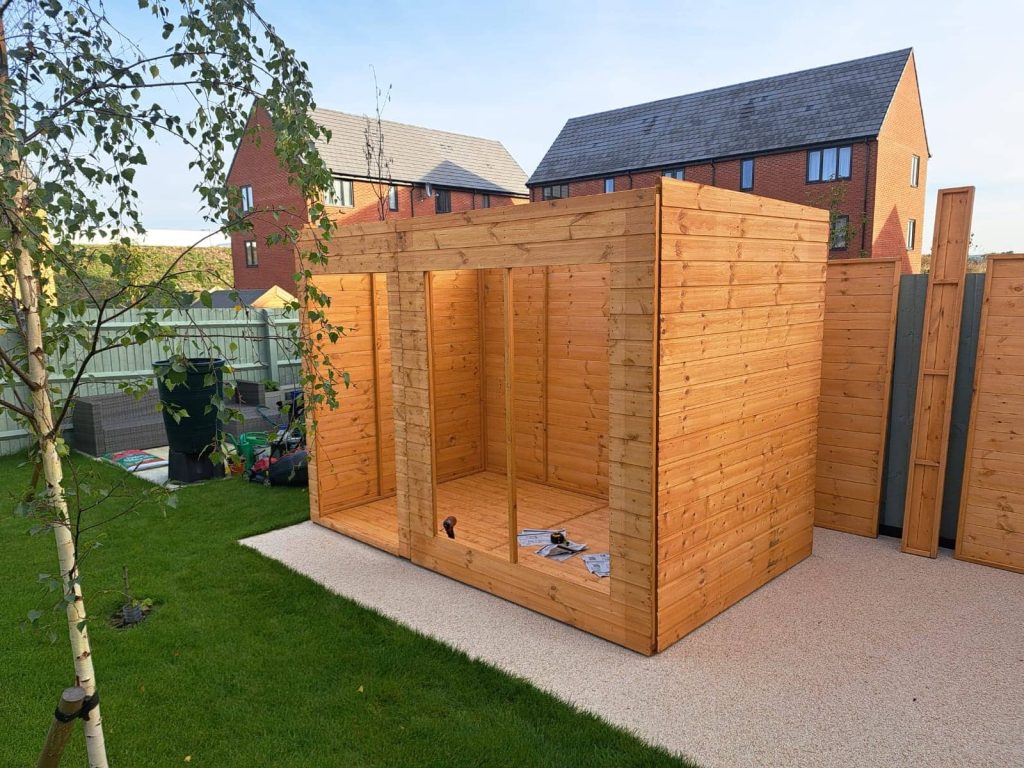 Newly built cabin standing on a solid concrete base.
